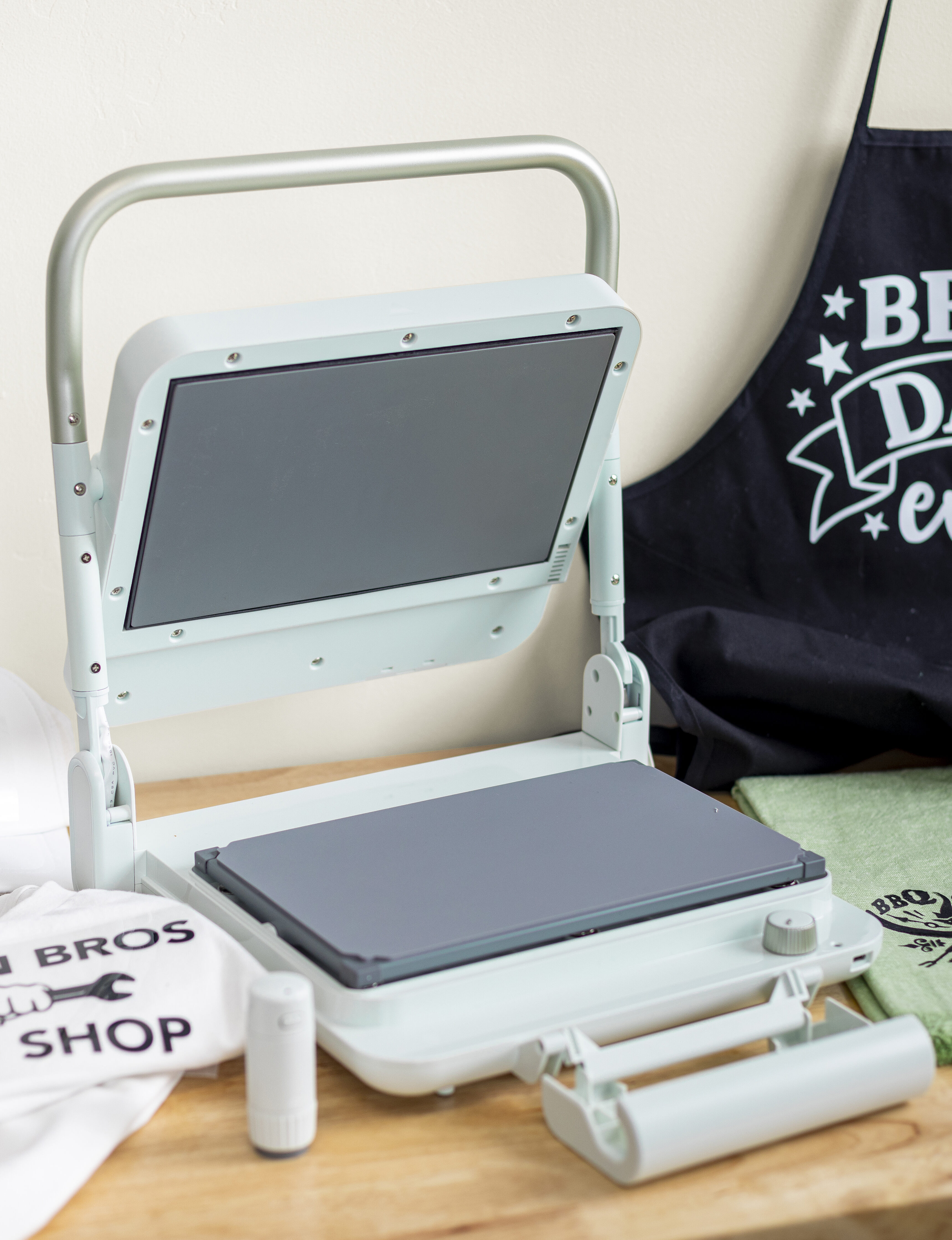 Silhouette cloChé Heat Press set up in a crafting space.