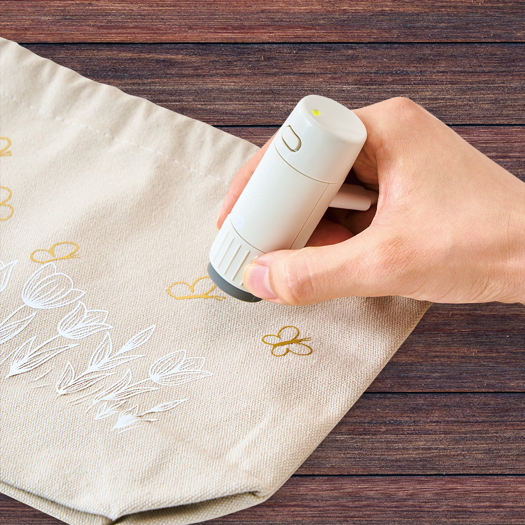 cloChé Petite being used on small pouch.