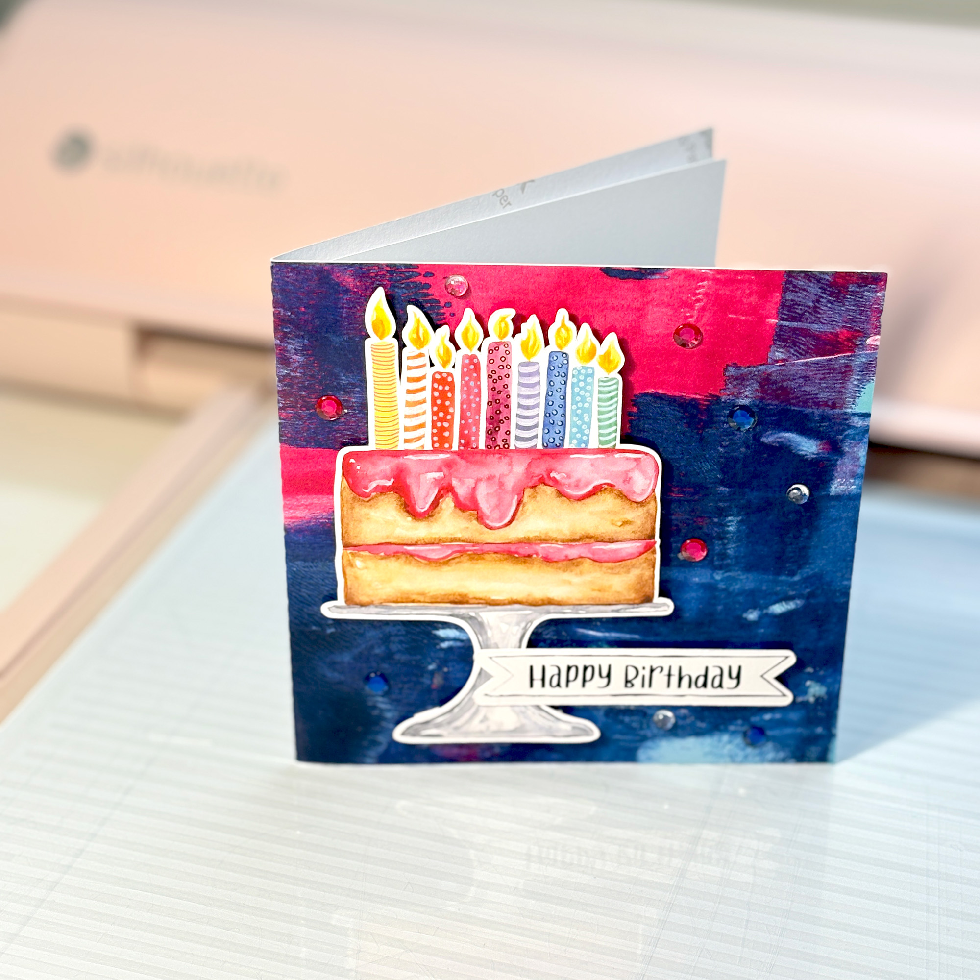 Pink Strawberry Icing Cake with Candles Birthday Card featuring Doodled Sentiment Happy Birthday Frame and Printable Background by Clikchic Designs